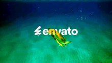 Sea Turtle slowly swims down to sand seabed, Slow motion