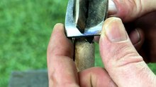 Metal cross to secure a hardwood hoe handle