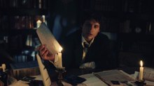 Talamasca: The Secret Order Guy Anatole Looks at Old Documents and Then Burns a Photo of Himself Promo Video 2K - Nicholas Denton