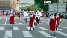 Южная Корея: тысячи людей наблюдают за шествием роботов-монахов по историческому Сеулу