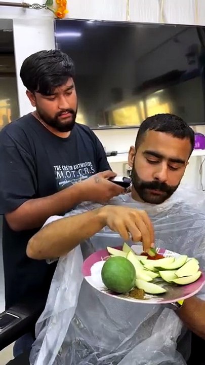Getting a haircut while eating raw mango hits different 😂🥭✂️🤢