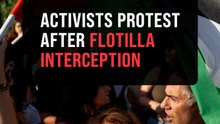 Flotilla activists and supporters protest outside Greece's foreign ministry after interception