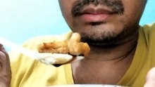 eating pempek, very hard