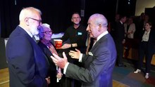 King Charles speaks with deaf actors during NI cinema visit