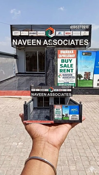 Hand_throws_shop_model_materializes_202605151250