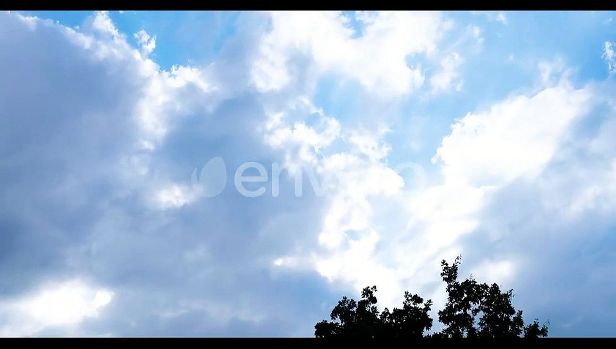 Dramatic Clouds Moving in a Blue Sky