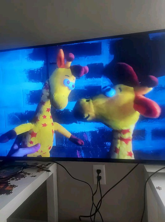 Geoffrey and Andy Giraffe are hugging each other/Father and Son/Super Kamek Films