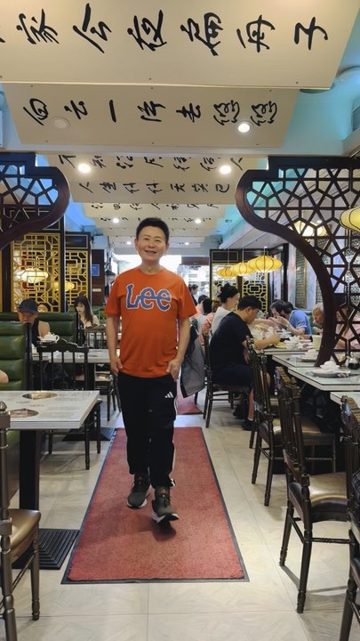 Nelson Wang was invited by Ms. Zhuang to enjoy a Shanghai-style lunch in Flushing on May 22, 2026.