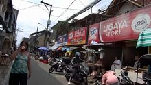 Inquisitive Stroll on Dumalay Street in Quezon City in the Philippines