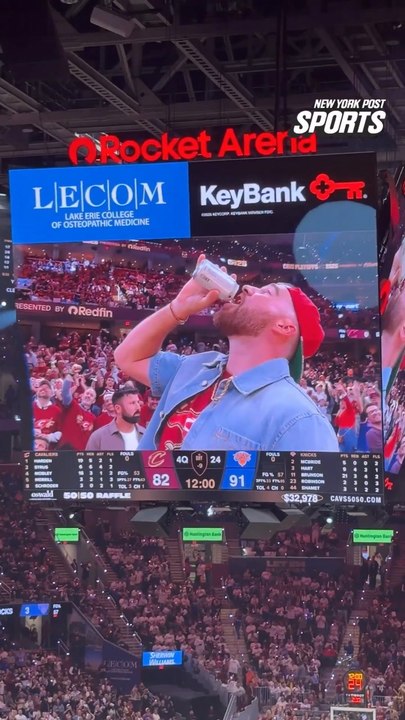 Travis Kelce chugs beer during Knicks v. Cavs Game 3
