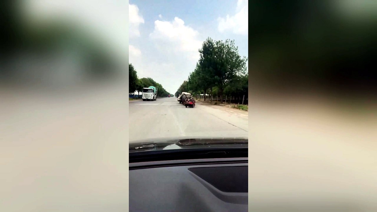 Out-of-control Trailer Swerves Wildly Down Road