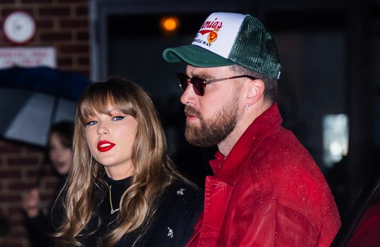 Travis Kelce defends his 'classy chug' and 'mock defeat' slump during a date night with Taylor Swift