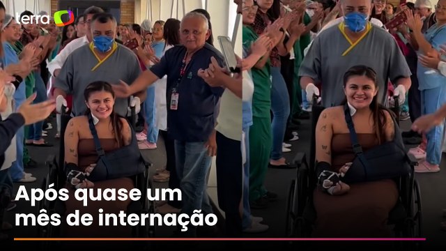 Jovem que teve as mãos decepadas por ex recebe alta de hospital com corredor de aplausos no Ceará
