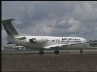 Take-off Fokker100 Brit-Air F-GKHD at the airport of Rennes