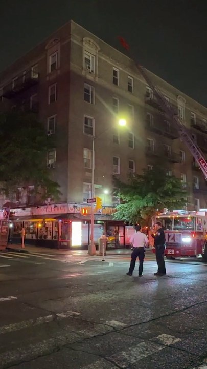 Firefighters swarm Queens apartment building af...