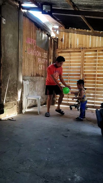 Isaiah playing balloon