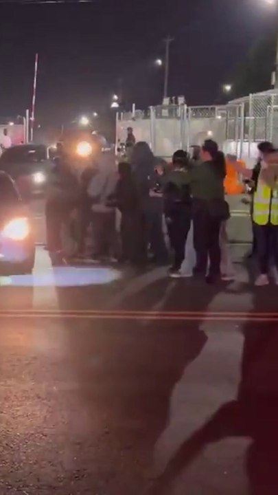 Protester struck by car outside ICE facility during standoff