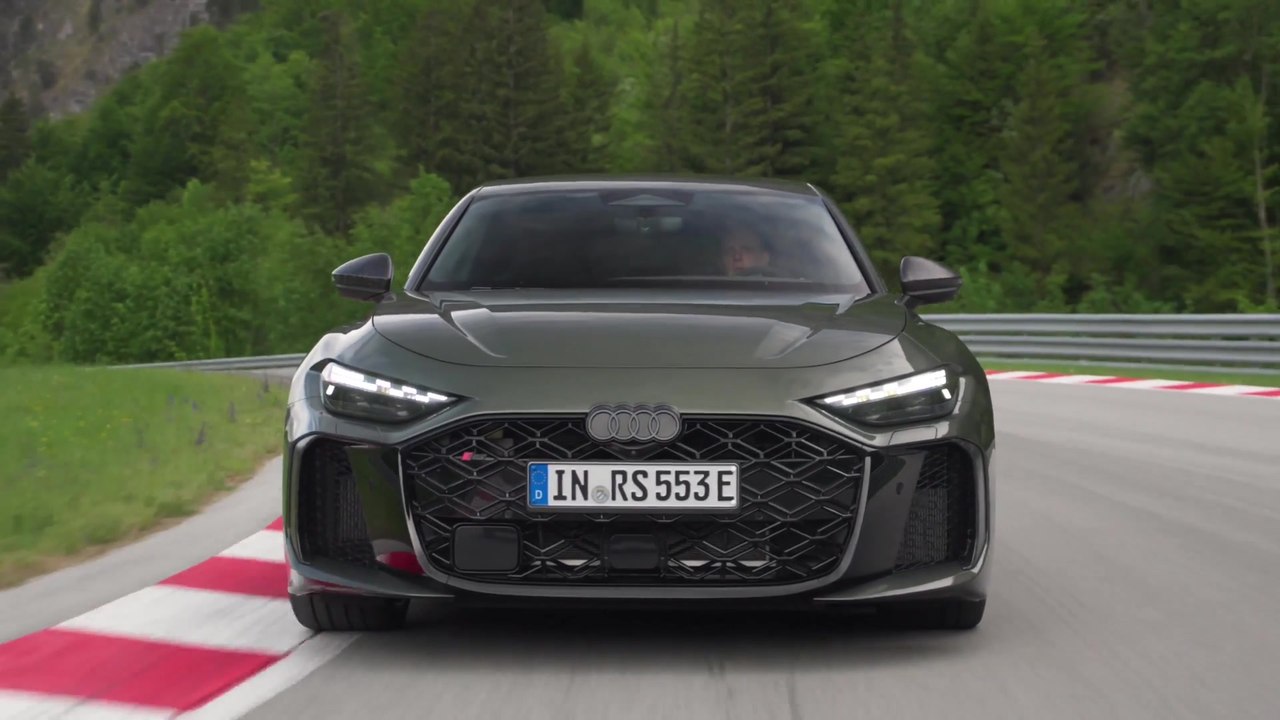 The new Audi RS 5 Sedan in Bedford green Track...