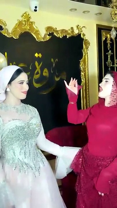 Best Friends Having Fun in Beautiful Gowns