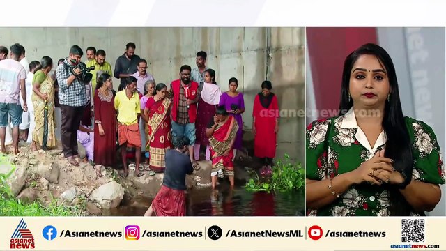 മഴ തുടങ്ങിയപ്പോൾത്തന്നെ വീടുകൾ വെള്ളത്തിൽ; വെള്ളത്തിലിറങ്ങിനിന്ന് നാട്ടുകാരുടെ പ്രതിഷേധം