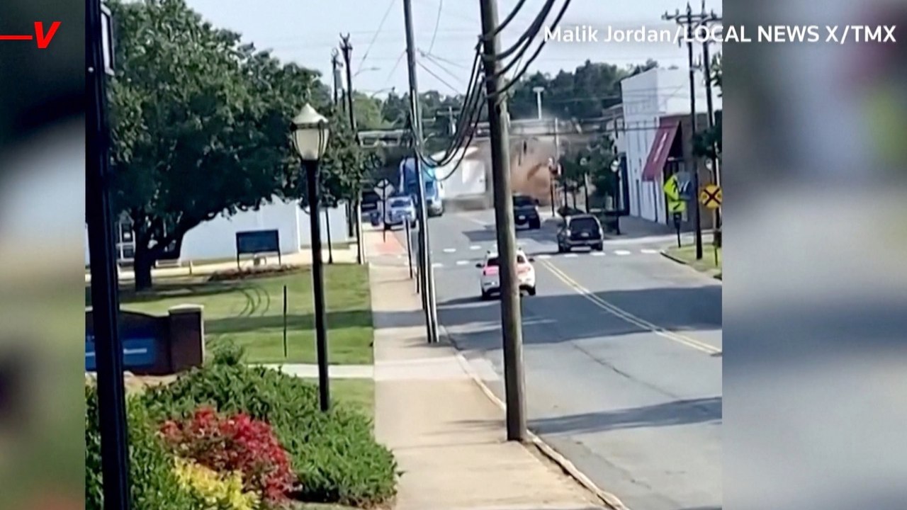 North Carolina freight train collides with semi-trailer in Wingate, dramatic video