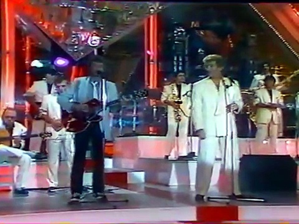 1984 - Johnny Hallyday - “Mes Seize Ans” en Duo avec Eddy Mitchell dans “Champs-Élysées” (Antenne 2, 29 Septembre)