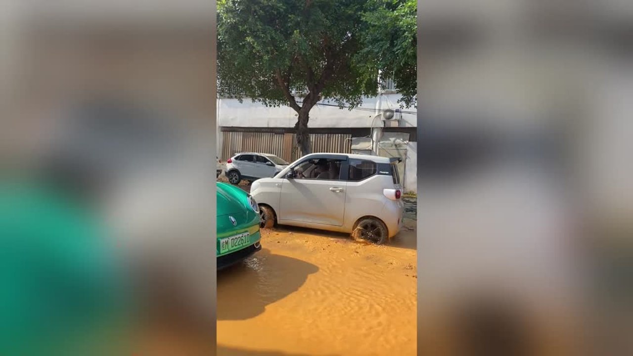 Stuck Car Blinds Driver With Mud on Windscreen