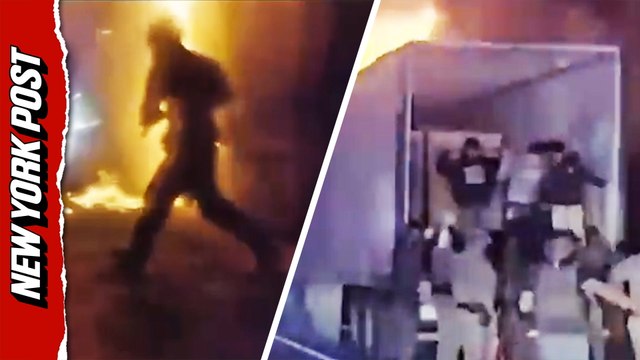 Dozens of illegal migrants rescued from burning trailer