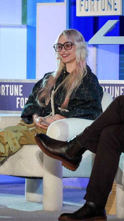 Grimes: AI music slop is flooding Spotify, but it's a win for artists