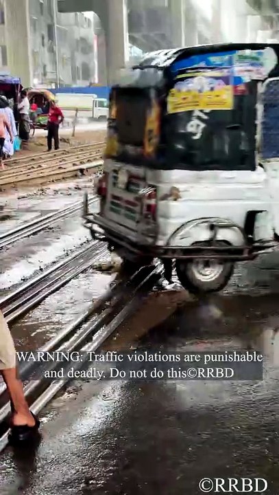 Rain-washed railway crossing. 🌧️🚦🛤️