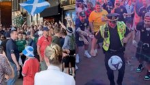 Scotland fans lose their mind after watching a Boston police officer play keepy-uppy