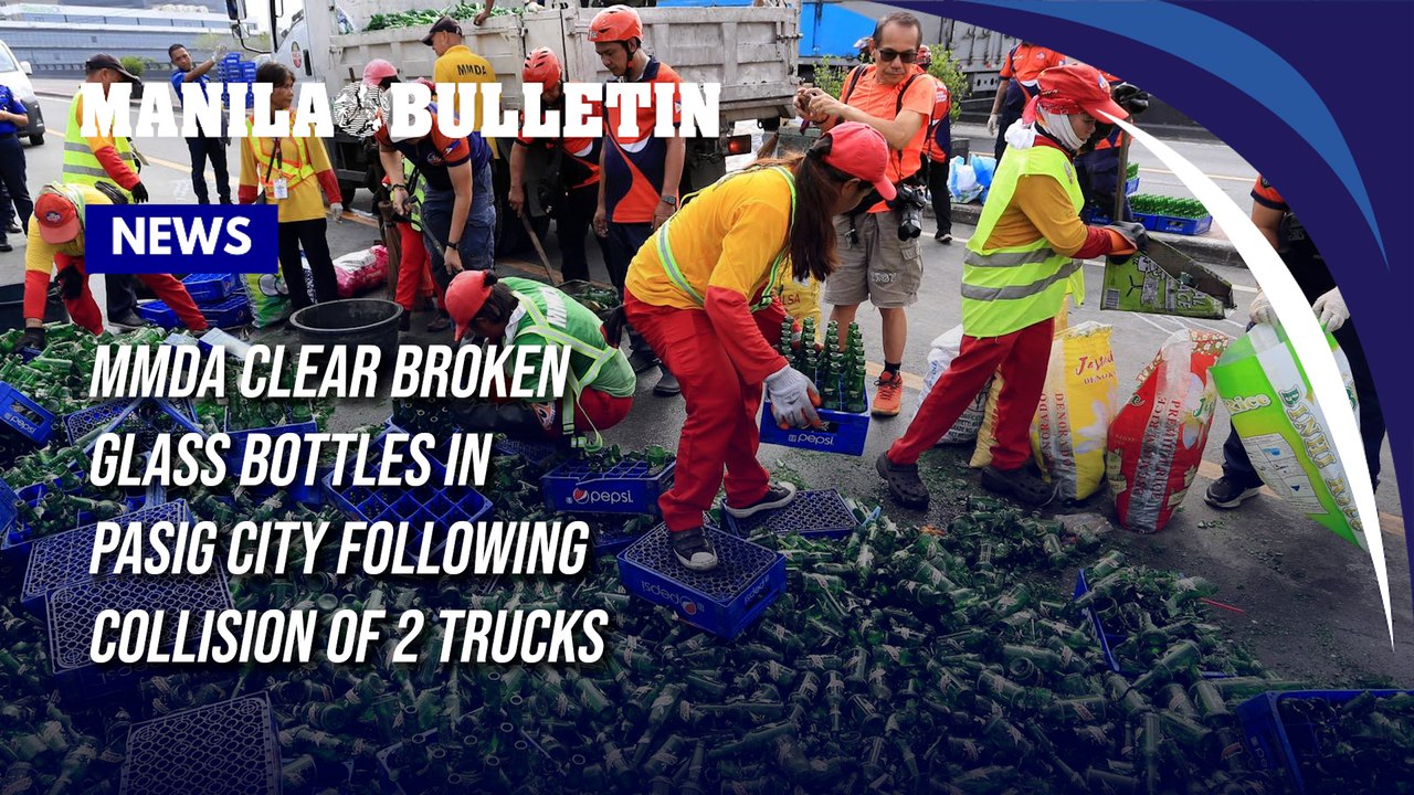 MMDA clear broken glass bottles in Pasig City following collision of 2 trucks