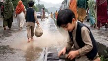 Poor boy on road