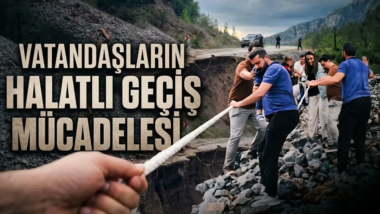 Heyelan nedeniyle kapanan köy yolunda vatandaşlar halatlarla karşıya geçti