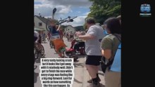 Elderly fan in a mobility scooter causes huge cycling race crash after driving straight into the peloton