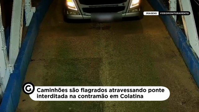 Caminhões são flagrados atravessando ponte interditada na contramão em Colatina