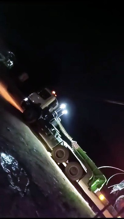 Late Night Heavy Equipment Transport at a Kalimantan Mining Site
