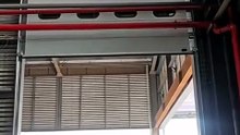 Dock shelter compatible high-speed doors integrated with existing dock shelters.