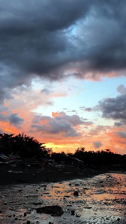 Fiery skies and quiet shores