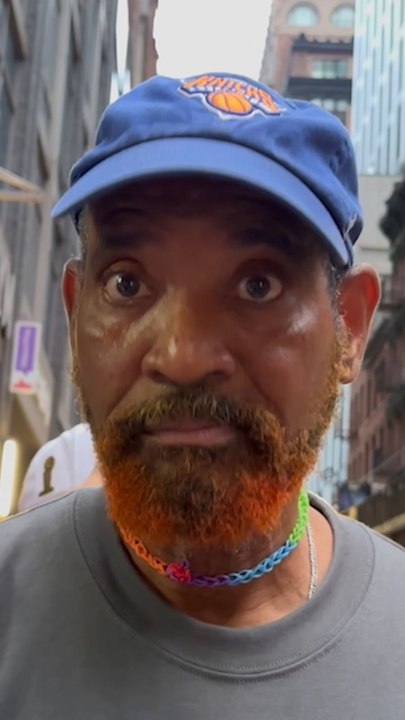 Knicks fan flies cross-country for parade