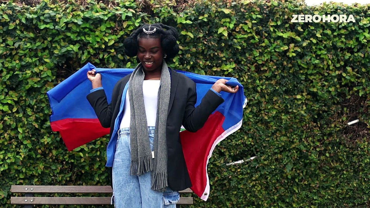 Imigrante haitiana vive expectativa de jogo com o Brasil