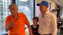 Three generations of Knicks fans celebrate by watching the championship parade