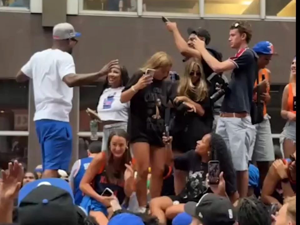 Love and basketball were in the air in New York City on Thursday as thousands flooded downtown Manhattan to celebrate the Knicks longawaited championship parade and the NBA stars werent the only ones sporting new rings