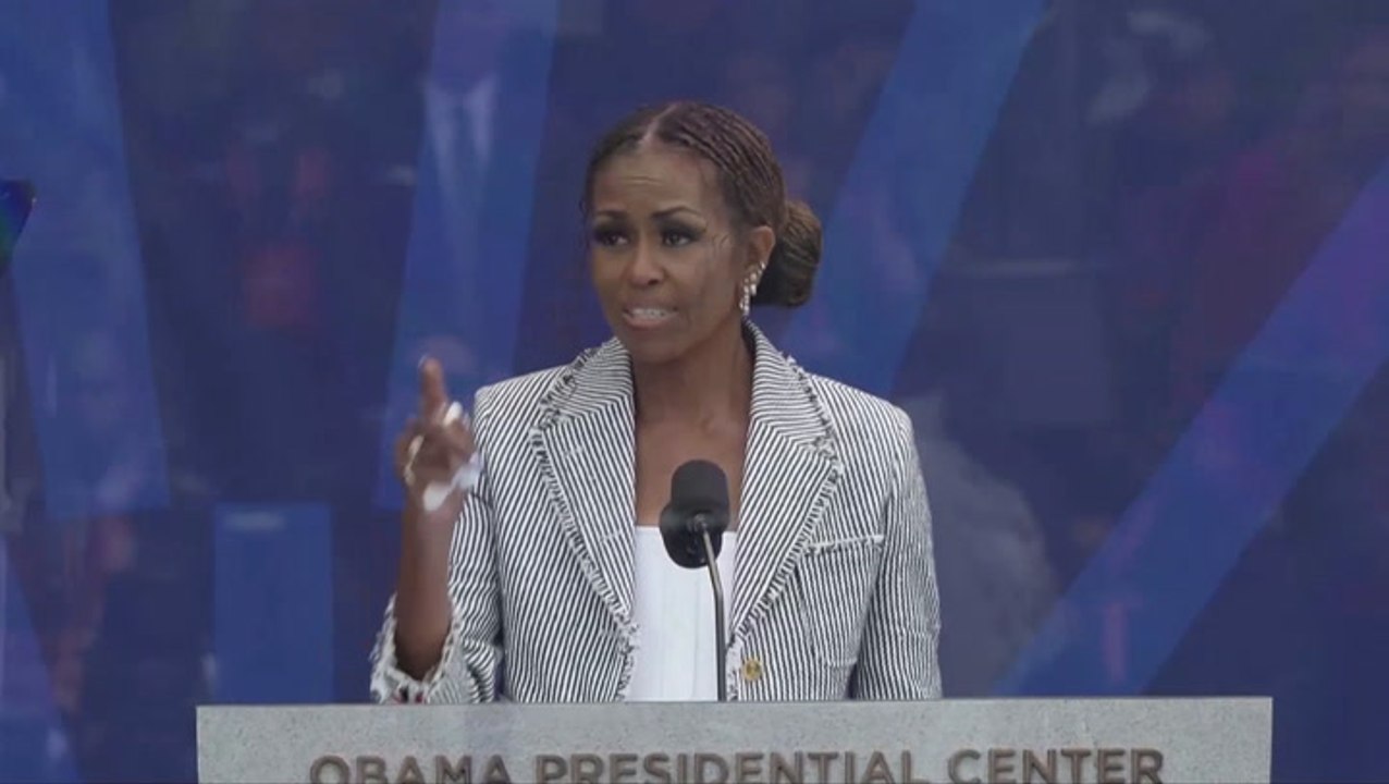 Hillary Clinton howls with laughter as Michelle...