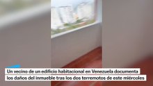 Un vecino documenta los daños a un edificio tras los dos sismos de este miércoles