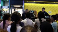 PM serves popcorn to students