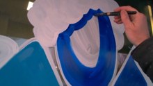 Talented Artist Creates Eye Catching Artwork For Business Exterior
