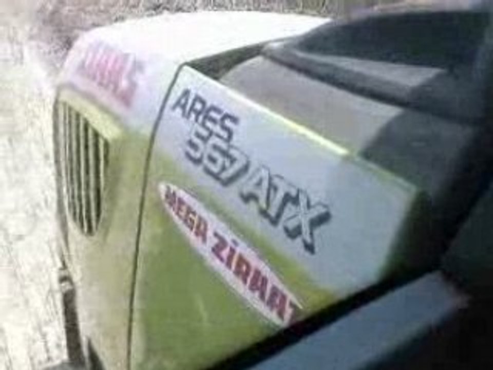 CLAAS ARES 567 ATX PLOUGHING THE CANOLA FIELD 2008 PART4