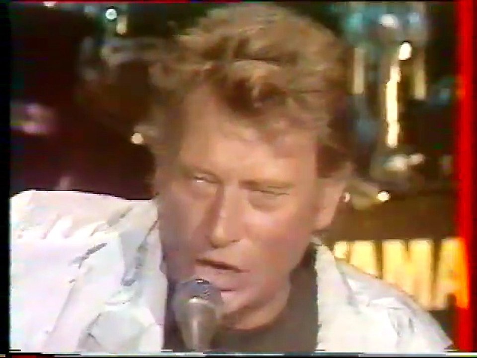 1988 - Johnny Hallyday chante La Musique Que J'Aime en duo avec Richard Bohringer dans Mélodies sur la Croisette sur TF1 (11 Mai)