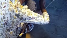 girl fixing the car tire